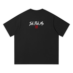 Black unisex t-shirt featuring “Ink Pick Me” logo and red stamp detail on back, made from soft organic cotton.