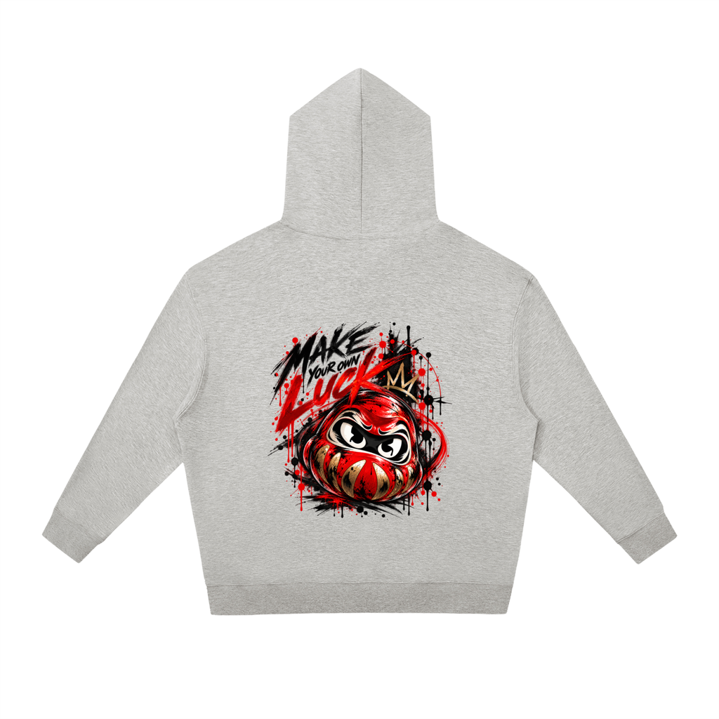 Gray unisex oversized hoodie featuring a colorful Daruma graphic, with "MAKE YOUR OWN LUCK" text on the back.