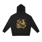 Black oversized hoodie with a Daruma graphic on the back, featuring "FALL RISE REPEAT" in bold yellow font.