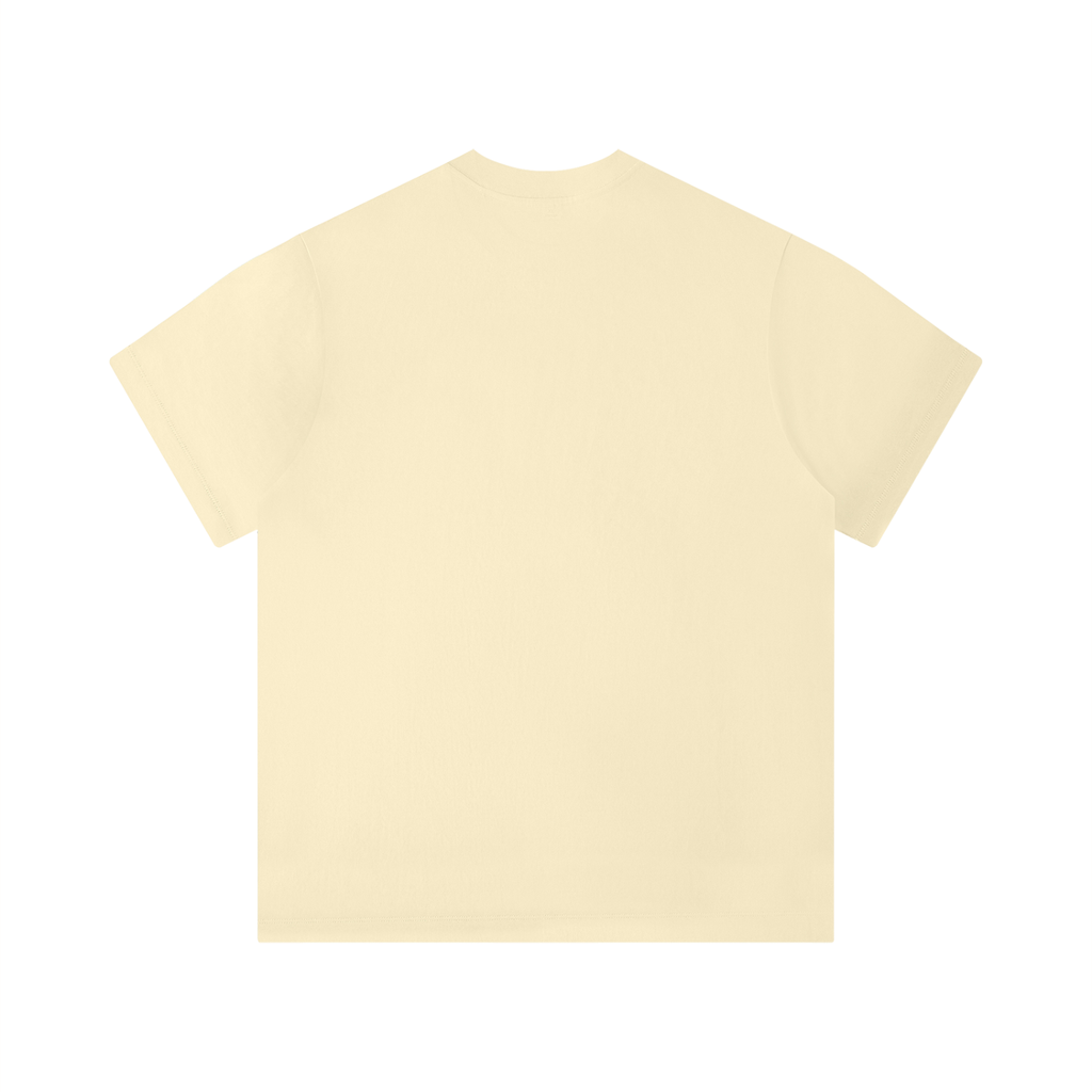 Solid color unisex t-shirt in light yellow, featuring a classic round neckline and short, regular-fit sleeves.