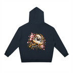 Oversized dark navy hoodie featuring a Daruma design accented with cherry blossoms and the text "Love Purity" on the back.