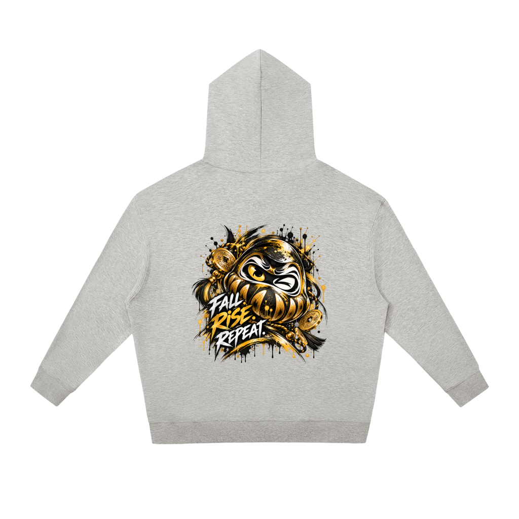 Gray oversized hoodie featuring a Daruma graphic with the text "FALL. RISE. REPEAT." on the back.