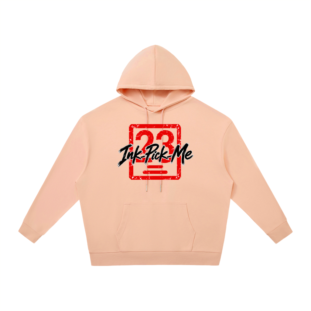 Unisex oversized peach hoodie featuring a bold red graphic and "Ink Pick Me" logo with a kangaroo pocket.
