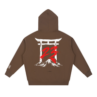 Hoodie oversize Torii 23 café Ink Pick Me, torii, montagnes et 23 rouge au dos