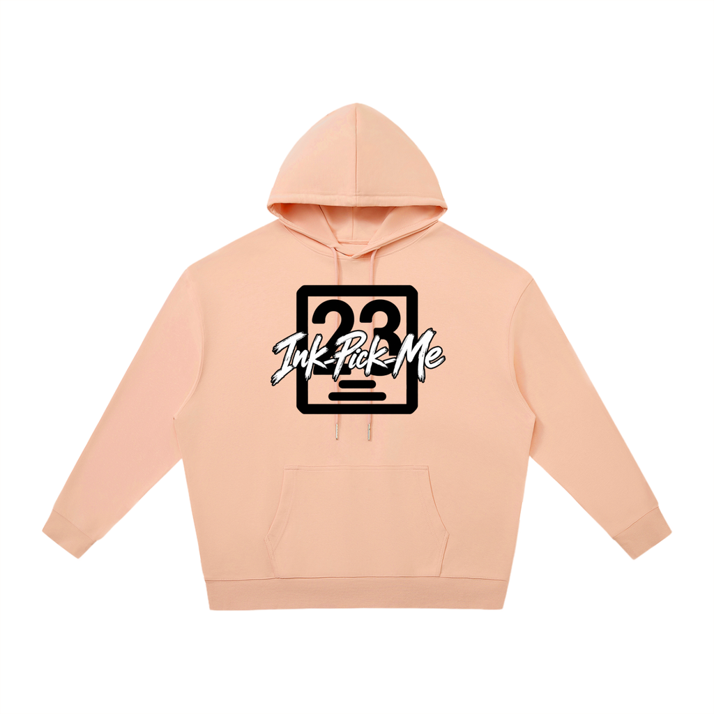 Pink oversized hoodie with a drawstring hood, kangaroo pocket, and black graphic text "Ink Pick Me" and "23" on the front.