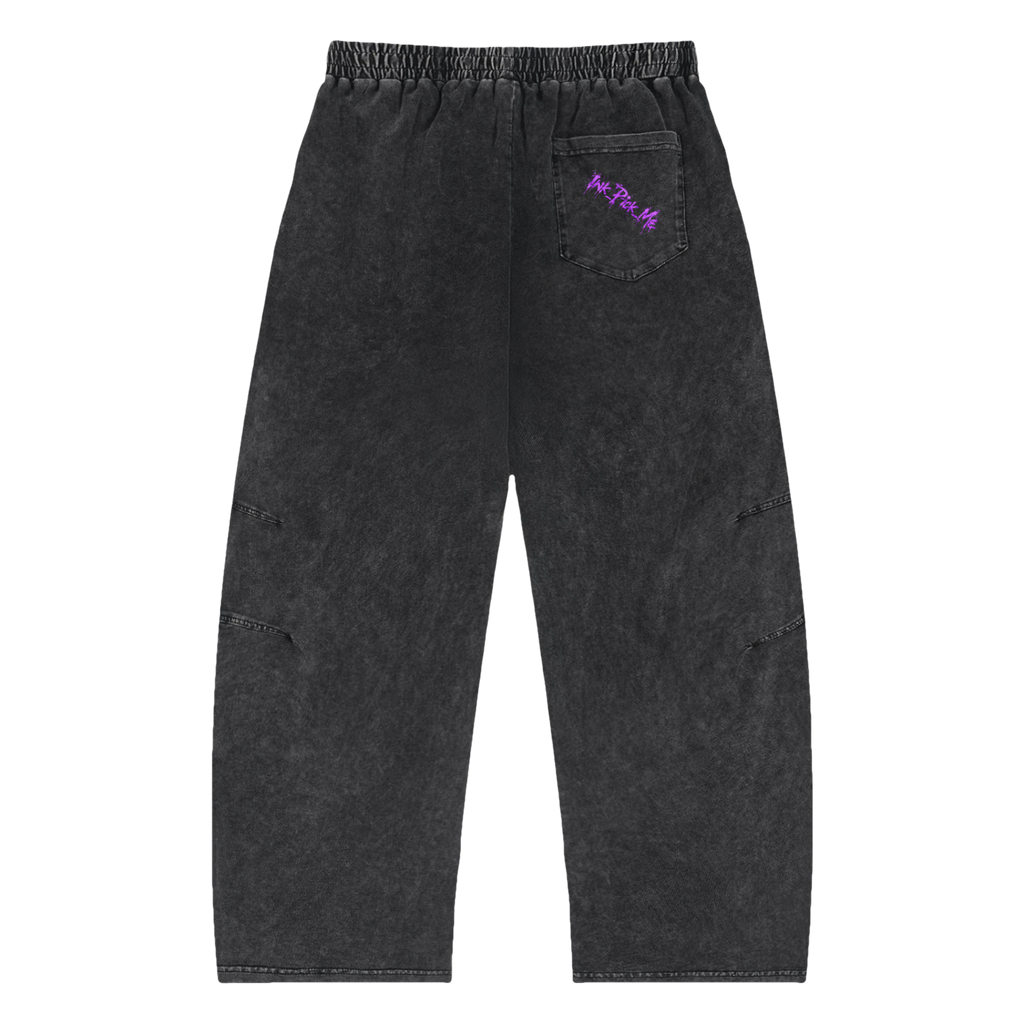 Black oversized pants with a faded look, featuring a purple "Ink Pick Me" logo on the back pocket.