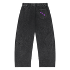 Black oversized pants with a faded look, featuring a purple "Ink Pick Me" logo on the back pocket.