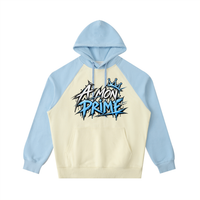 Hoodie oversize Urban Crown Ink Pick Me abricot clair et bleu ciel, graffiti noir et bleu – vue de face